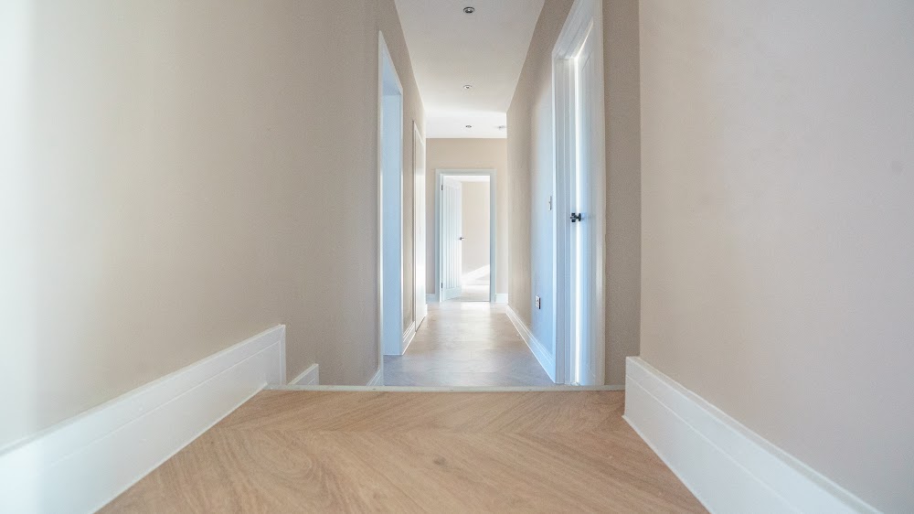 Hallway with new flooring and fresh decoration